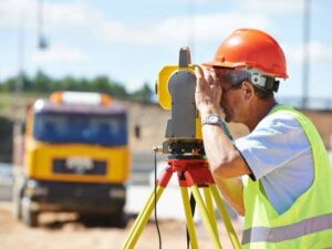 Surveyor performing a due diligence survey before rezoning in Ogden Utah